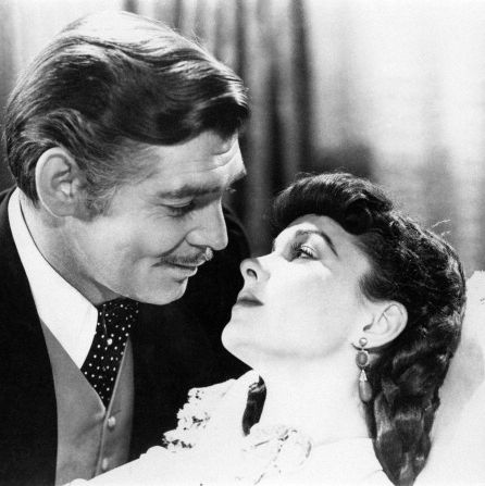 clark gable and vivien leigh embrace in a scene from the movie gone with the wind
