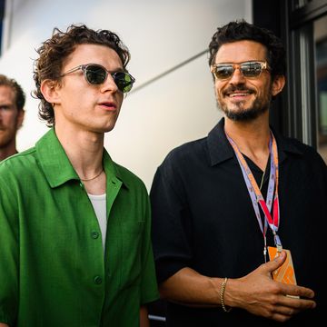 actors tom holland and orlando bloom seen in the f1 paddock