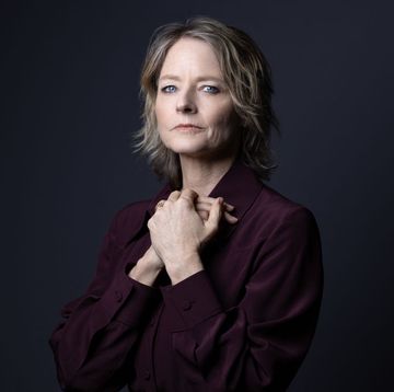 jodie foster looking ahead for a portrait photo and clasping her hands