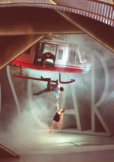 Actress Jamie Lee Curtis (bottom) hangs onto a stu actress jamie lee curtis bottom hangs onto a stu