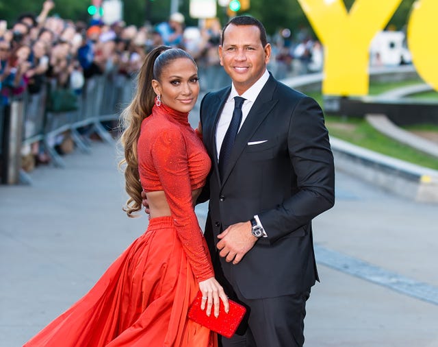 Alex Rodriguez Kisses Jennifer Lopez At Her 50th Birthday Party