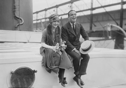 actress mary pickford and actor douglas fairbanks aboard ship during honeymoon, 1920