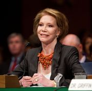 mary tyler moore sitting at a microphone looking up at a congressional panel