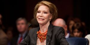 mary tyler moore sitting at a microphone looking up at a congressional panel
