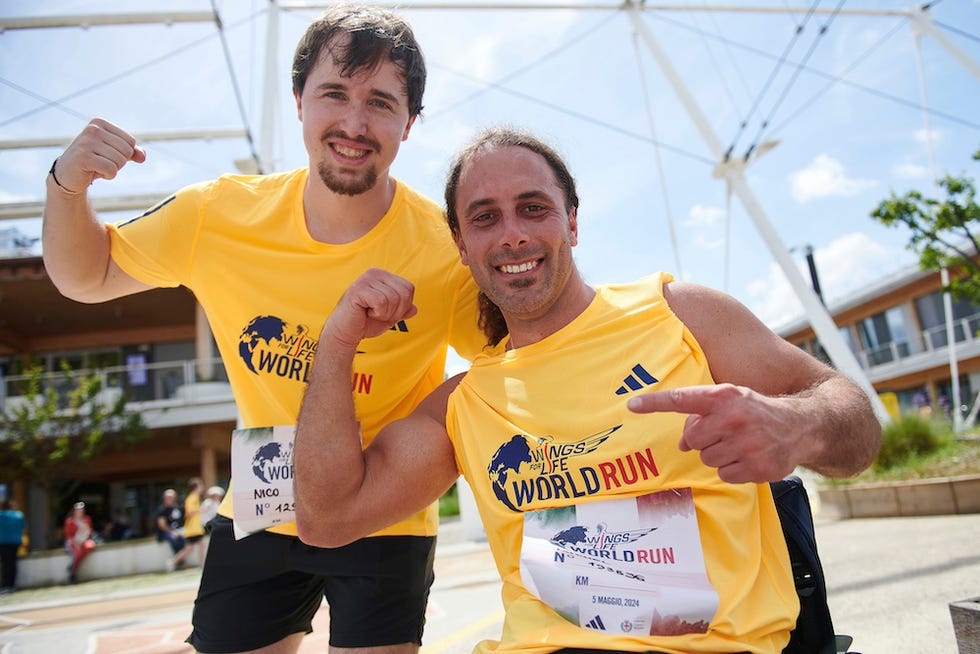 michel roccati and nicolò macellari pose during the wings for life world run app run event in milan, italy on may 05, 2024