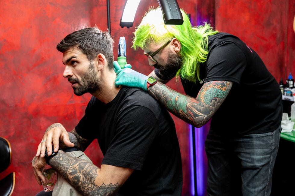 adam collard gets tattooed on his neck, tinder's ink twice event at sixty ink