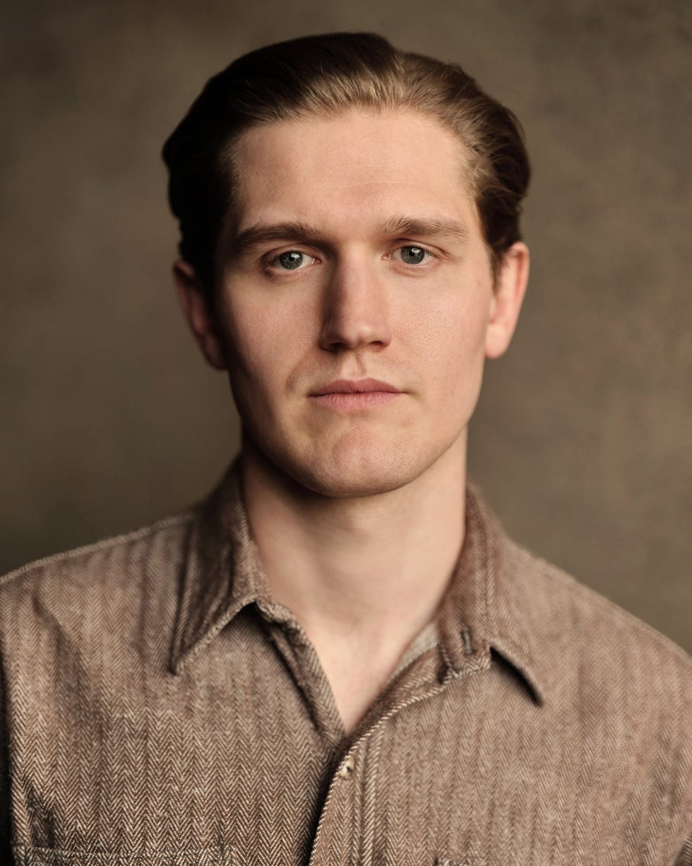Portrait of a person in a brown herringbone shirt