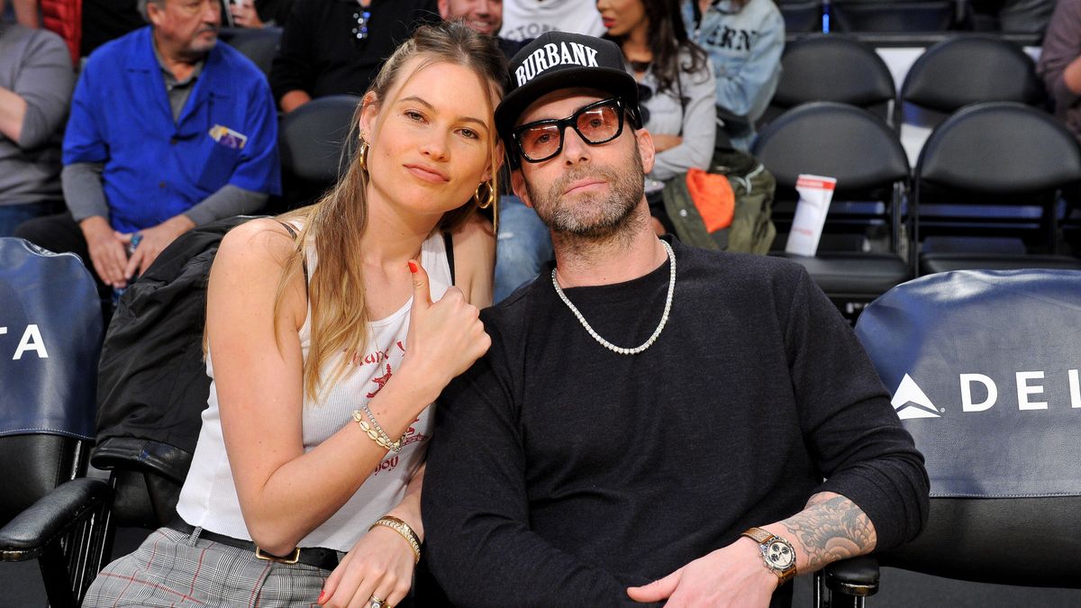 preview for Behati Prinsloo & Adam Levine’s Cutest Moments