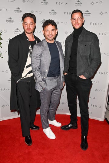 adam and ryan thomas with brother scott on november 23 2023 in manchester england