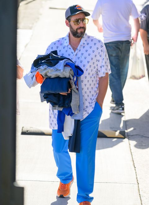sandler ﻿and a giant armful of clothing outside ﻿jimmy kimmel live ﻿on june 1, 2022