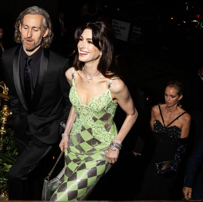 anne hathaway with husband at clooney foundation for justice's