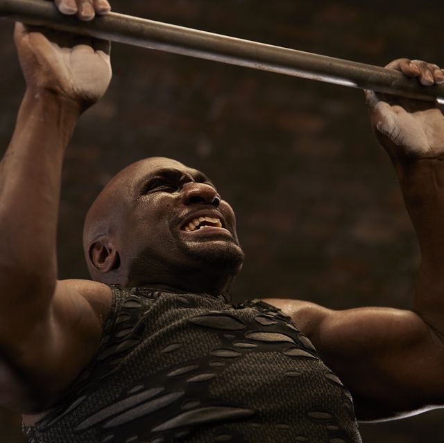 man having weigh training in gym