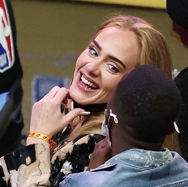 Adele Wears a Louis Vuitton Coat to the NBA Season Opener