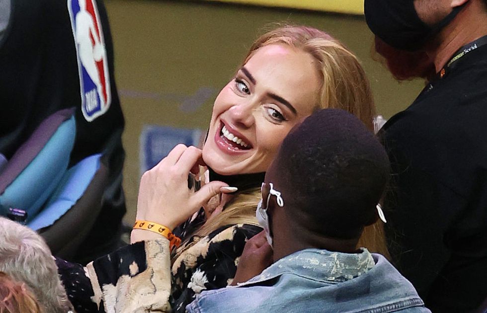 adele and rumoured new boyfriend rich paul seen out together at basketball game