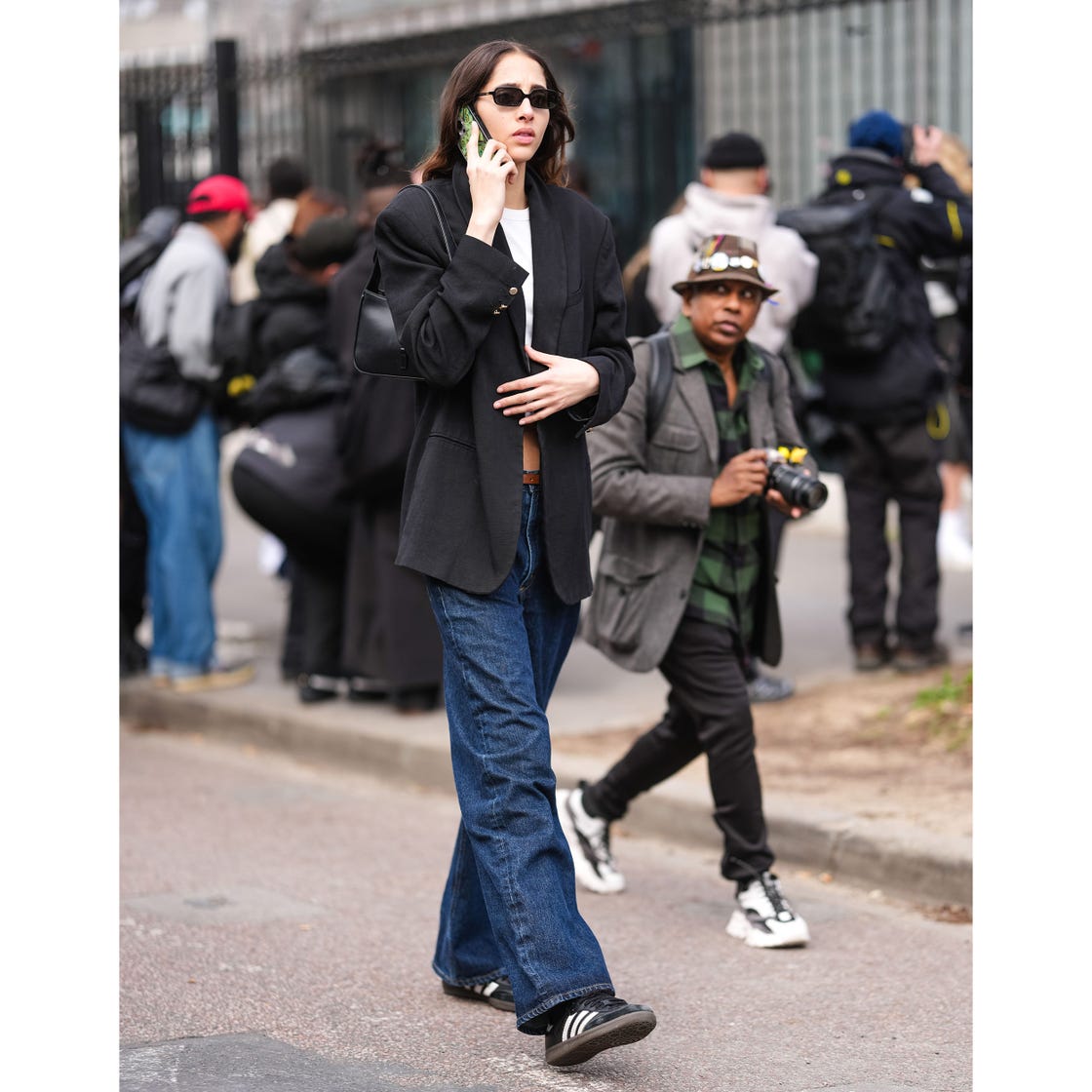 woman walking while on phone