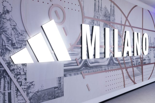 sign displaying milano with a modern design in a branded setting