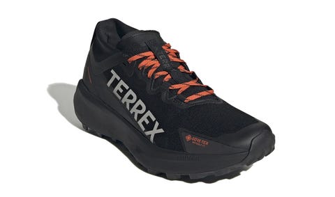 a lightweight and durable black hiking shoe designed for outdoor activities