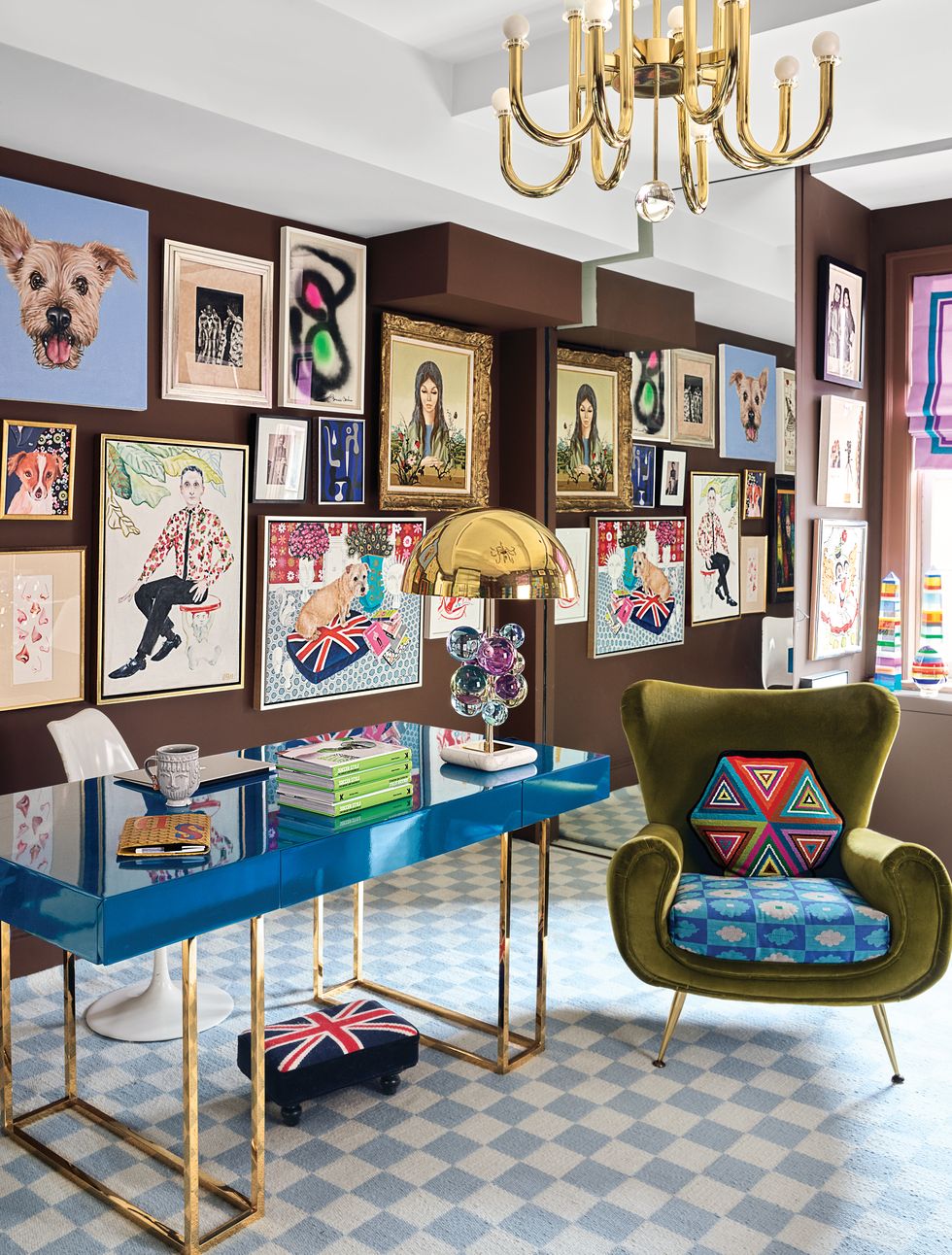 Office with desk, chair, light checkered rug, artwork on walls