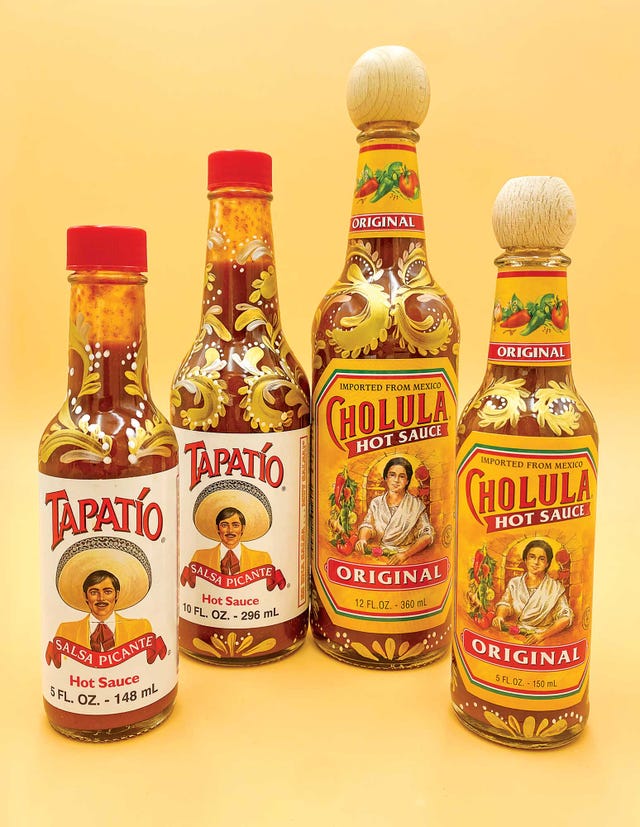 adornamented hot sauce bottles, teresa flores