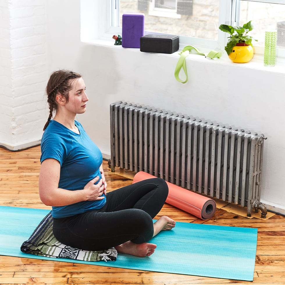 adrienne performing a breathing exercise