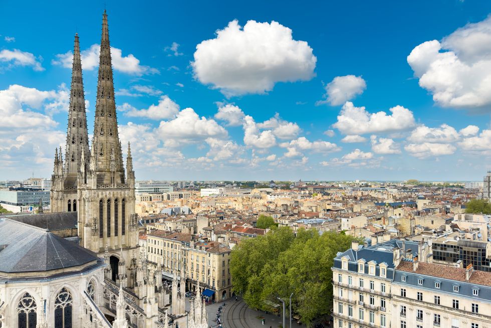 aerial cityscape view on the old town of bordeaux city with st andrew cathedral during a sunny day in france high quality photography
