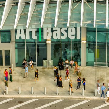 aerial photo people walking by the art basel miami beach