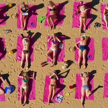 aerial shot of duplicated woman sunbathing on beach