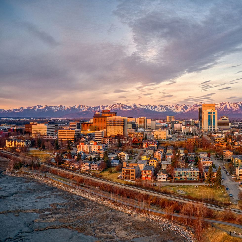 aerial view of a sunset over downtown anchorage, alaska in spring
