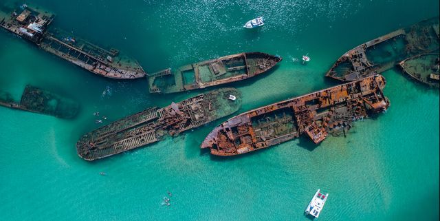 Aerial View Of Abandoned Ships In Sea