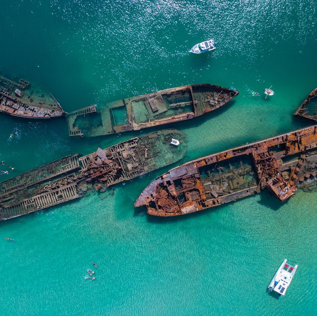 aerial view of abandoned ships in sea