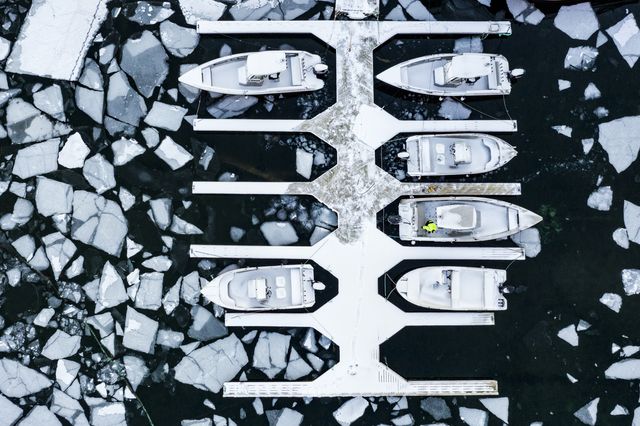 Aerial view of boats in the icy sea, Ballstad, Norway