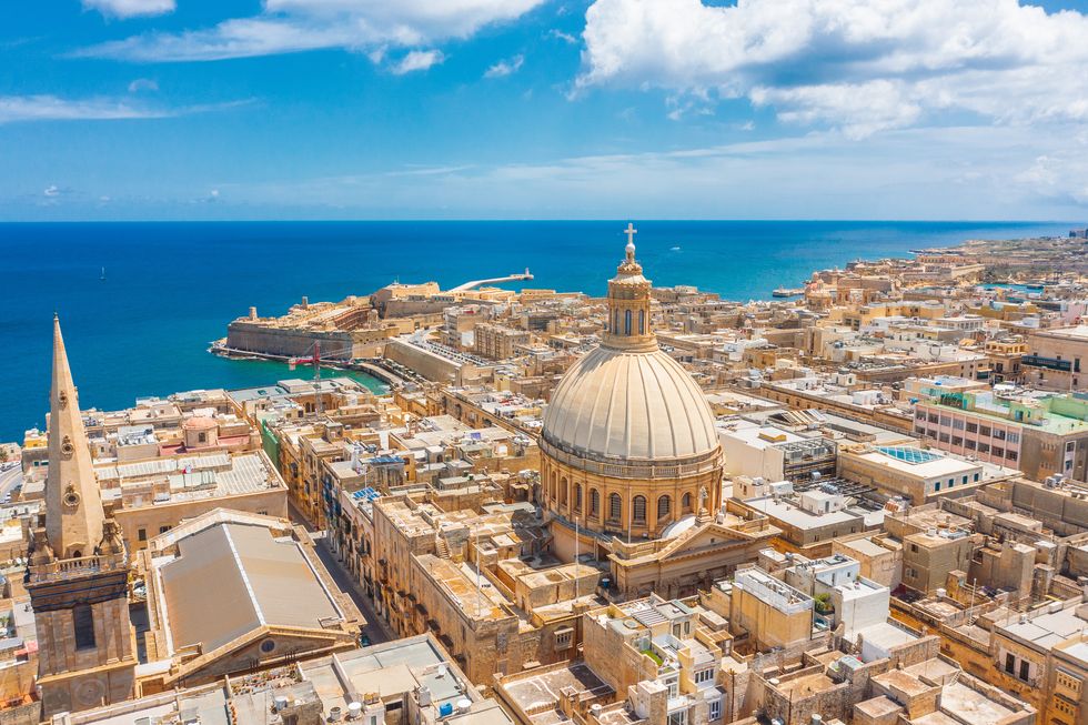 aerial view of lady of mount carmel church, stpaul's cathedral in valletta city, malta