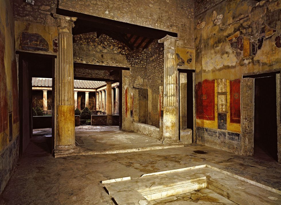 In het atrium ontving de heer des huizes elke ochtend zijn clinten Op deze foto is het atrium van de Villa Menandro in Pompe te zien