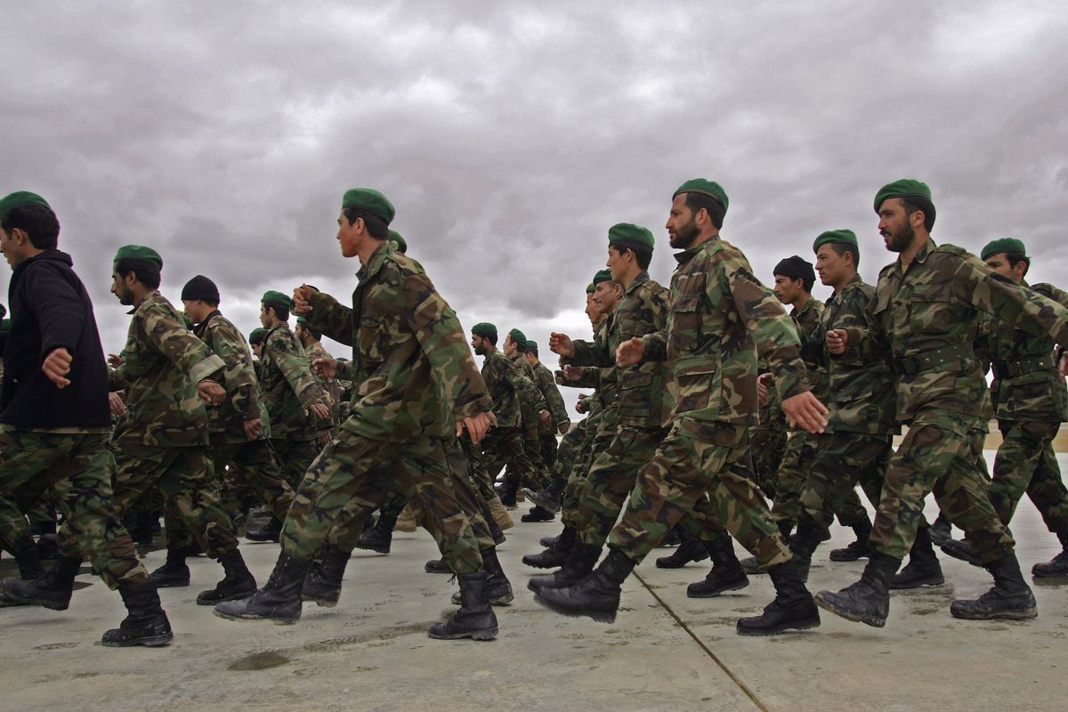 shorabak, afghanistan   march 11  afghan army soldiers march to a briefing at camp shorabak in afghanistan's helmand province march 11, 2007 the soldiers were due to head into battle the following day along with british troops participating in operation achilles fighting taliban in northern helmand  photo by john mooregetty images