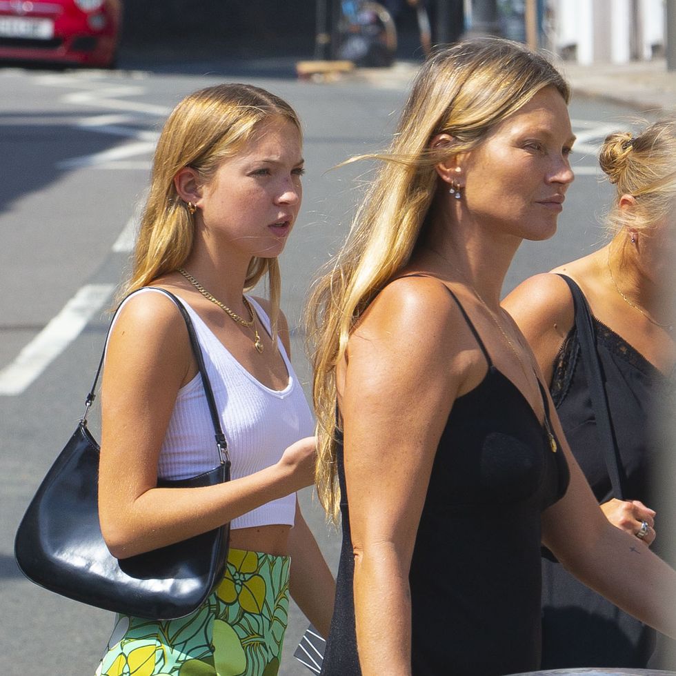 exclusive kate moss was enjoying some more quality time with lila grace as they headed for lunch at jin kichi japanese restaurant in hampstead on wednesday the supermodel, 47, looked in great spirits and glowing on the outing, where she was also joined by her yoga instructor and friend, nadia narain kate looked effortlessly stylish as she slipped into a black maxi dress, which showed off her curves she teamed the garment with a pair of black sandals and toted a small laser cut handbag, completing the look with a delicate gold necklace lila grace also looked stylish as she teamed a white crop top with a printed green dress and trainers nadia opted for an oversized blue shirt and khaki shorts on the outing among other things, nadia is known for her pregnancy yoga dvd 21 jul 2021 pictured kate moss, lila grace moss, lila grace moss hack photo credit mega themegaagencycom 1 888 505 6342