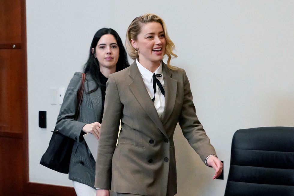 actor amber heard arrives at the courtroom during actor and her ex husband johnny depps defamation case against her, at the fairfax county circuit courthouse in fairfax, us, may 23, 2022  steve helberpool via reuters