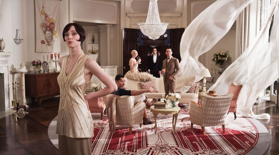 l r elizabeth debicki as jordan baker, joel edgerton as tom buchanan, carey mulligan as daisy buchanan and tobey maguire as nick carraway in warner bros pictures' and village roadshow pictures' drama "the great gatsby," a warner bros pictures release