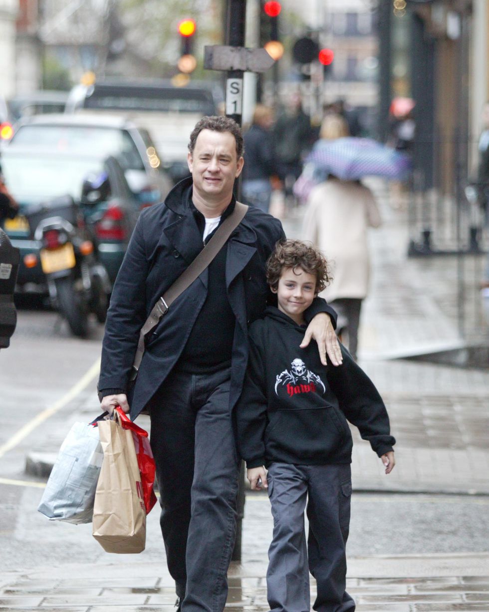 world rights actor tom hanks in london with 2 of his sons the actor looks happy and healthy and seems to have slimmed down a bit perhaps due to his giving up lattes and capuccinos in favor of that great british staple tea byline snapix sp033usage of this image is conditional upon the acceptance of big pictures, terms and conditions, available at wwwbigpicturesphotocomexclusive pictures