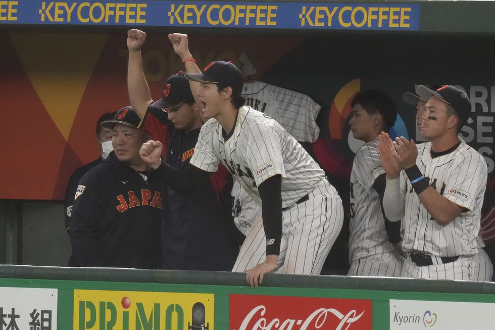 japans yu darvish and shohei ohtani celebrate after winning the game against south korea in the first round pool b game between south korea and japan at the world baseball classic wbc at tokyo dome in tokyo, japan, friday, march 10, 2023 ap photoeugene hoshiko