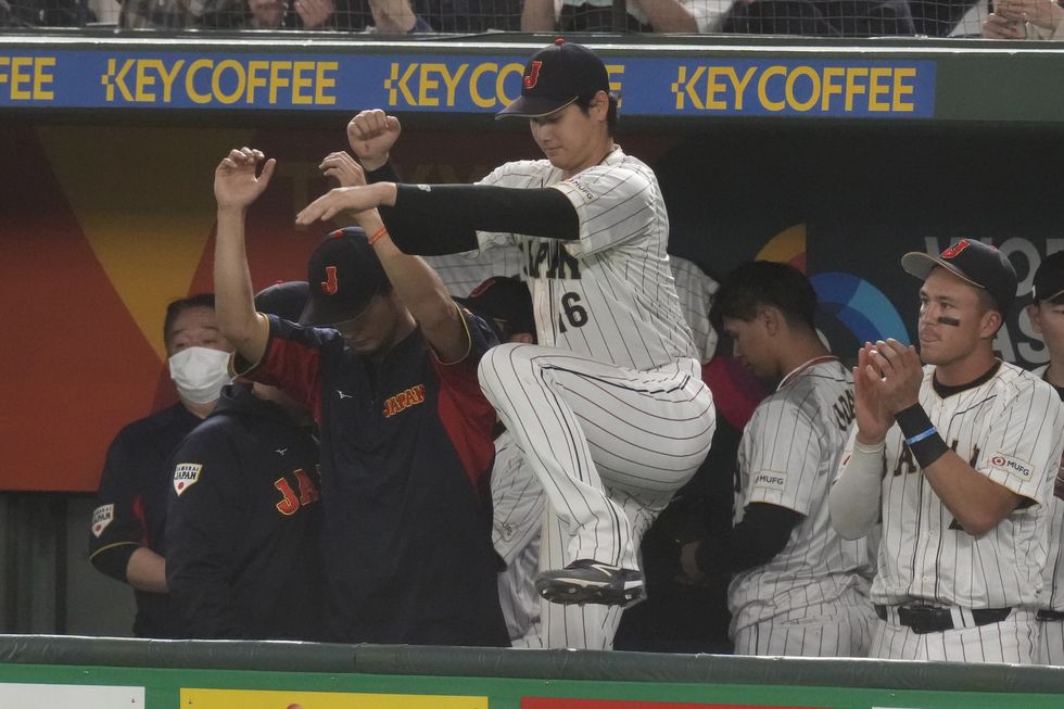 japans shohei ohtani comes to the ground to celebrate after winning the game against south korea in the first round pool b game between south korea and japan at the world baseball classic wbc at tokyo dome in tokyo, japan, friday, march 10, 2023 ap photoeugene hoshiko