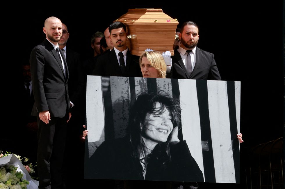 pallbearers carry the coffin of late singer, actress and muse jane birkin as they leave following the funeral ceremony at the church of saint roch in paris, france, july 24, 2023 reuterspascal rossignol