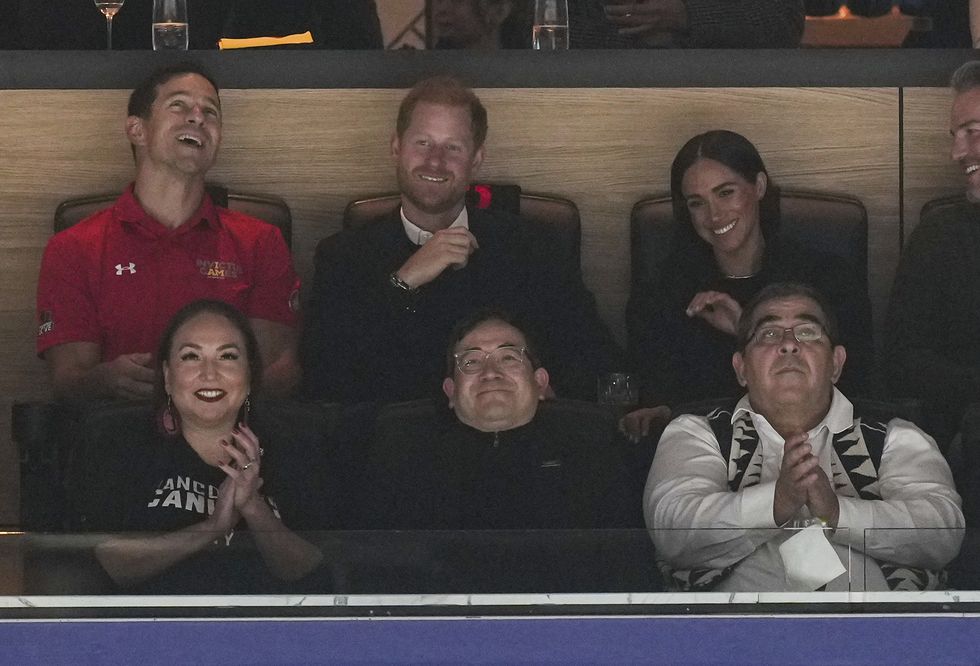 prince harry, top second from left, and meghan markle, top right, the duke and duchess of sussex, watch the vancouver canucks and san jose sharks play during the first period of an nhl hockey game in vancouver, british columbia, on monday, nov 20, 2023 the invictus games, founded by the duke of sussex, are scheduled to be held in vancouver and whistler in 2025 darryl dyckthe canadian press via ap