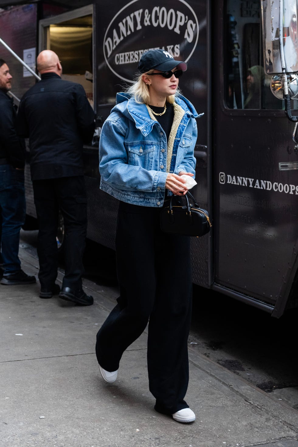 12062023 exclusive gigi hadid is spotted visiting rumored boyfriend bradley cooper who was cooking philly cheesesteaks inside of a danny coop's food truck in new york city the american supermodel was seen enjoying a bite to eat and also taking a large bag of food to go also seen visiting the truck was laura dernvideo availablesalestheimagedirectcom please bylinetheimagedirectcomexclusive please email salestheimagedirectcom for fees before use