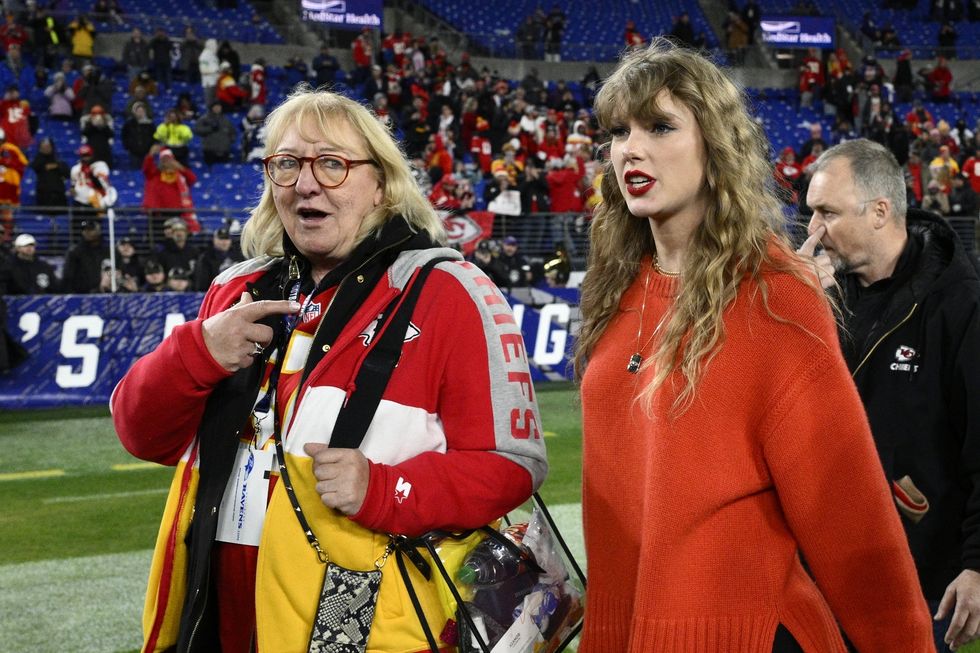 taylor swift, right, walks with donna kelce on the field after the afc championship nfl football game between the baltimore ravens and the kansas city chiefs, sunday, jan 28, 2024, in baltimore ap photonick wass