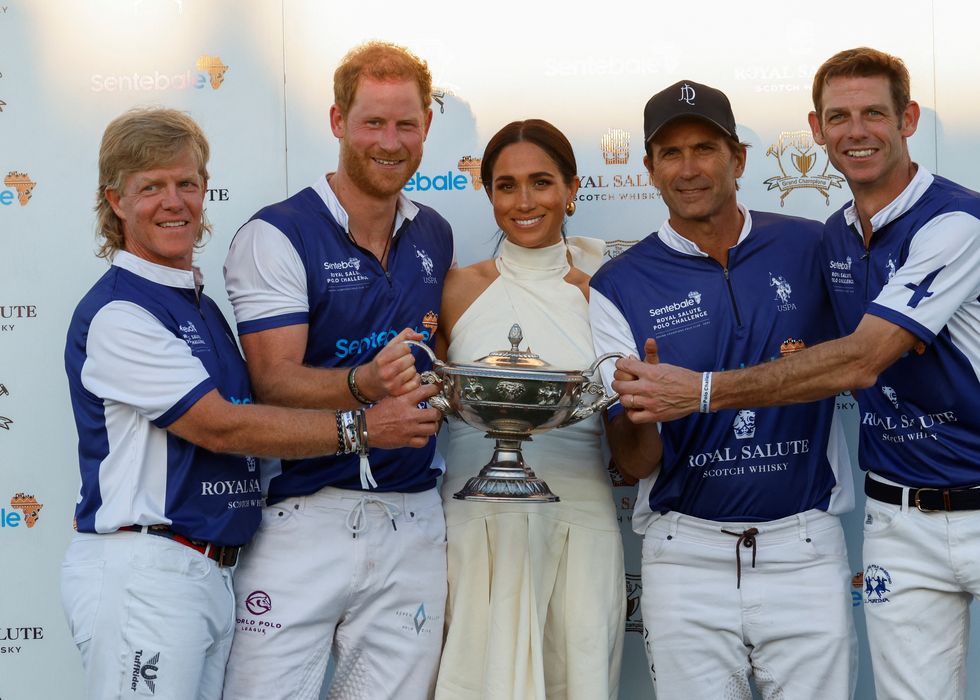britains prince harry and meghan, duchess of sussex, pose with other players as they attend the royal salute polo challenge to benefit sentebale, a charity founded by him and prince seeiso of lesotho to support children in lesotho and botswana, in wellington, florida, us, april 12, 2024 reutersmarco bello