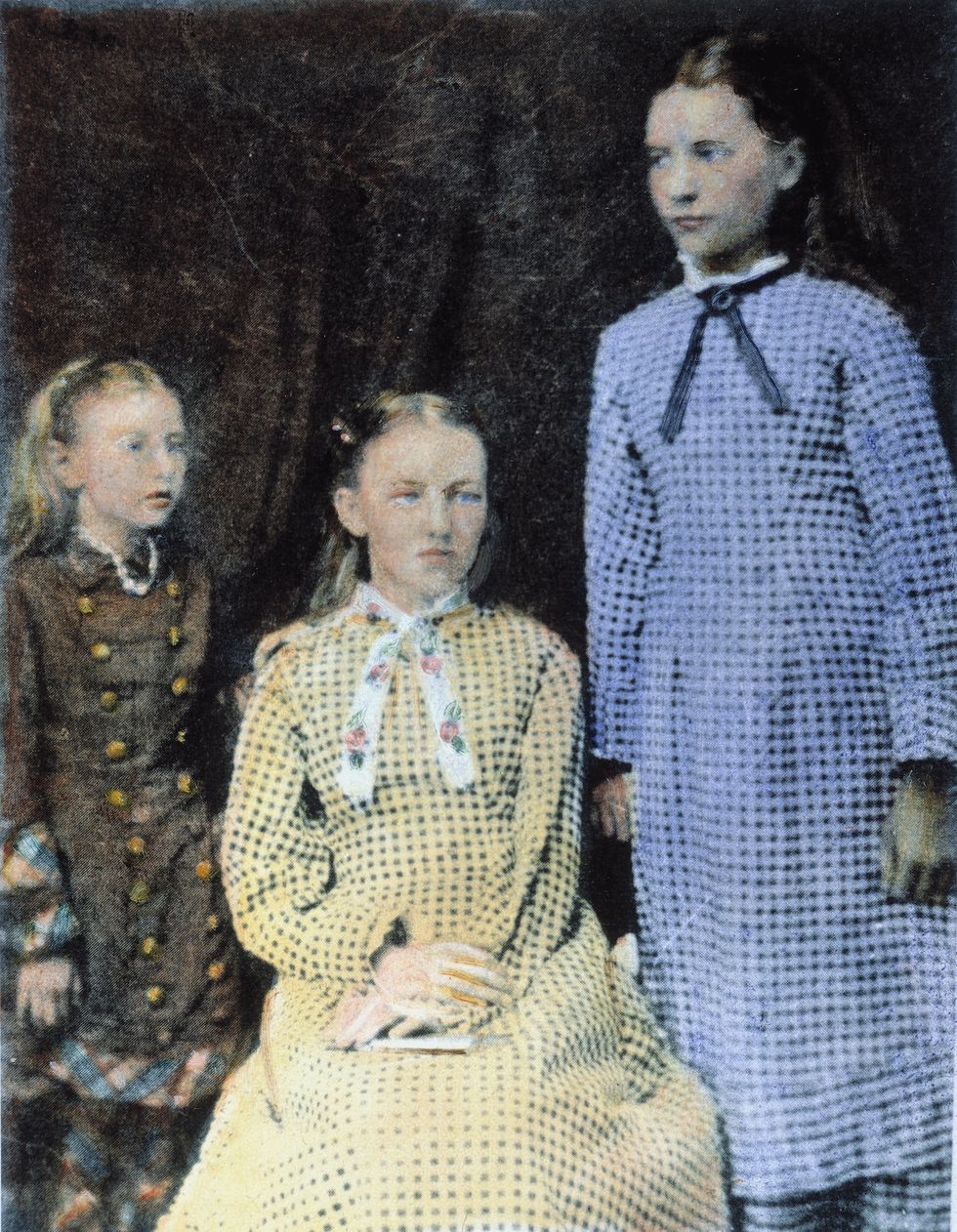 laura ingalls wilder n1867 1957 standing, with her sisters carrie, left, and mary, center oil over a photograph, c1880