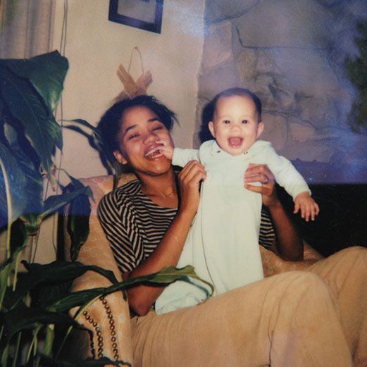 a person holding a baby, meghan markle and her mother doria