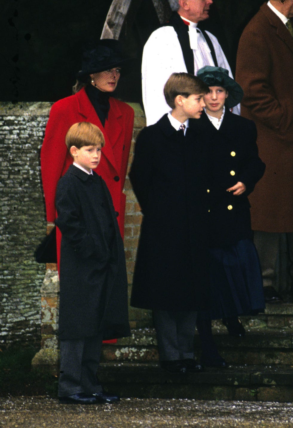 a group of people in black robes