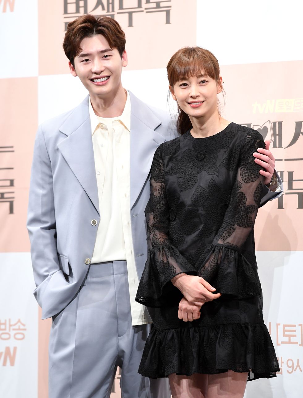 lee jong suk, lee na young attend the press conference of 'romance is a bonus book' at imperial palace hotel on january 21st in seoul, south korea photoosen