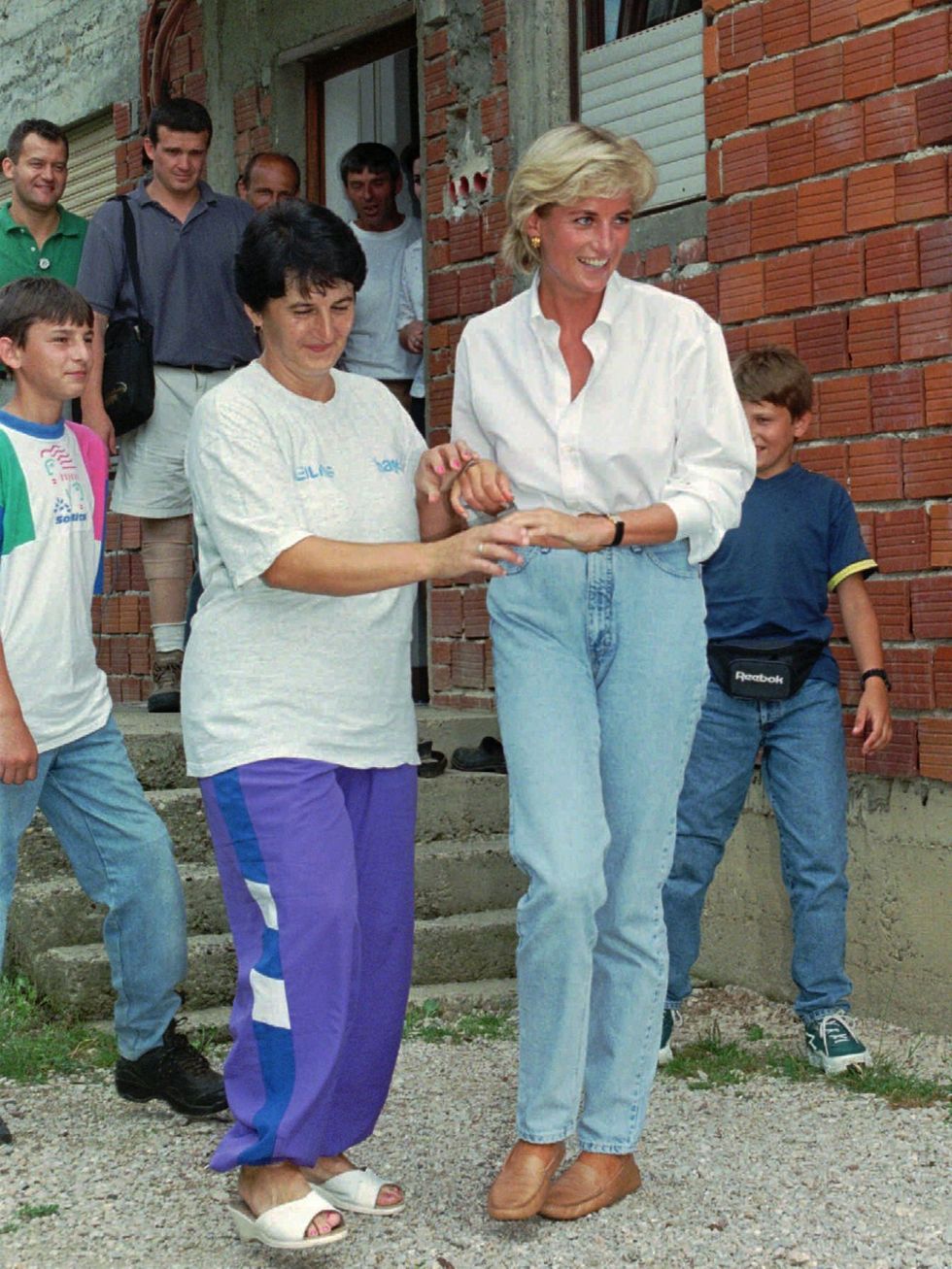 princess diana, aug 9, 1997  diana, princess of wales, right, talks with nevresa bradaric, left, in front of her house in the village of klokotnica, 35 kilometers 28 miles northwest of tuzla on saturday, august,9, 1997 princess diana visited mrs bradaric whose 14 year old son malik is one of the many victims of land mines scattered all over bosnia, with the purpose of drawing the world's attention to the land mine problem in bosnia ap photoamel emric